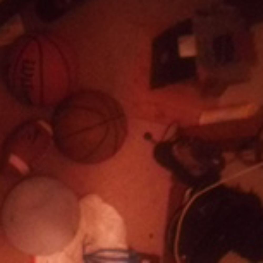 Three basketballs and a football